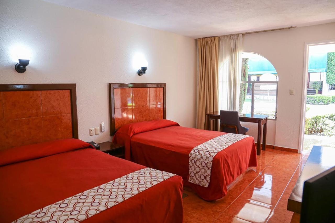 Hotel & Suites Villa Del Sol Морелия Экстерьер фото