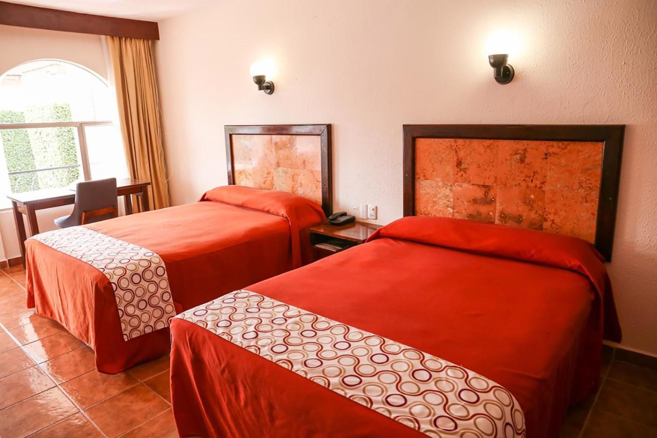 Hotel & Suites Villa Del Sol Морелия Экстерьер фото